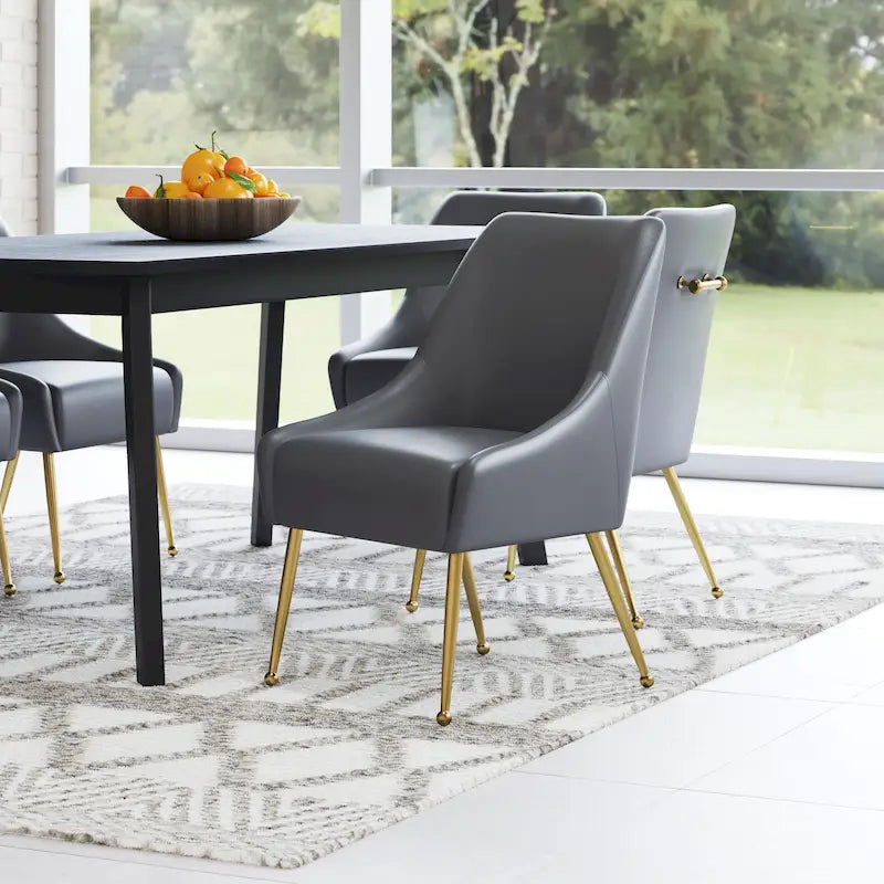Fauteuil rembourré avec pieds en métal doré, gris