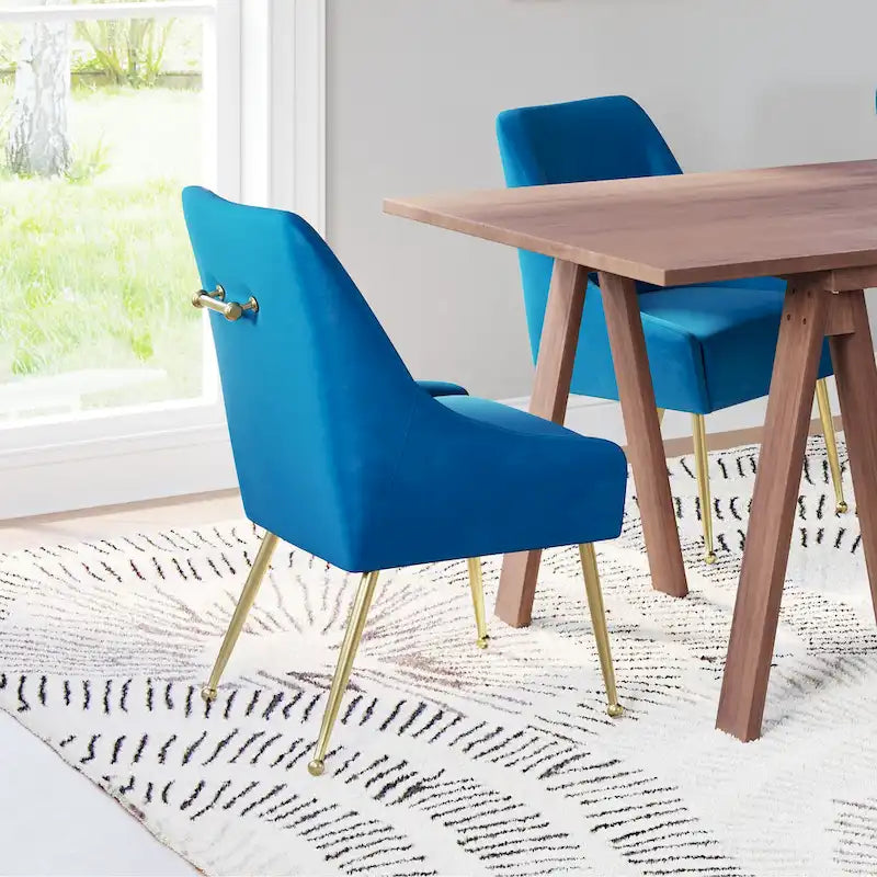 Gepolsterter Sessel mit goldfarbenen Metallbeinen, grau